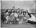 Image of Attendees decorating dance floor at USO, Seattle, December 26, 1947