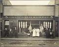 Image of Carstens Bros & Dashley Meat Market employees outside store, Nome, October 1908