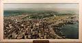 Image of Large framed colored photograph looking south at downtown Seattle from Queen Anne Hill, 1940s