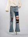 Image of Pair of bell-bottom jeans with patches, 1968-1980