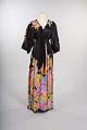 Image of Black dress with bright floral pattern designed by Richmond of Seattle, ca. 1970s-1980s