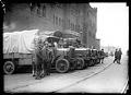 Image of Soldiers and trucks outside National Guard Armory, Seattle, February 1919