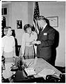 Image of Suzie Ordogh and John Boyd reading her order of parole, Seattle, December 26, 1956