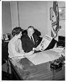 Image of Suzie Ordogh completing Alien Address report with John Boyd, Seattle, January 4, 1962