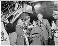 Image of Nancy Ramey with family on her return from the Olympics, Seattle, December 14, 1956