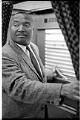 Image of Sam Smith at voting machine, September 16, 1969
