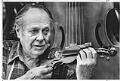 Image of Hammond Ashley holding a treble violin, Seattle, April 26, 1979