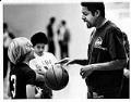 Image of Fred Brown coaching boys at Kingdome, Seattle, November 1980