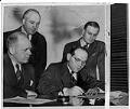 Image of Jesse Epstein signing off on Yesler Terrace project, February 27, 1941