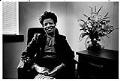Image of Dorothy Hollingsworth sitting in her office, Seattle, March 1986