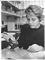Image of Dace Krasts working in lab at Immunex, Seattle, December 13, 1990