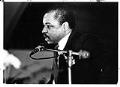 Image of Rev. Robert Jeffrey speaking during Eddie Bascomb's funeral at New Hope Missionary Baptist Church, February 24, 1987