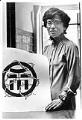 Image of Cherry Kinoshita holding symbol of Japanese American incarceration, Seattle, July 22, 1988