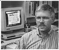 Image of Terry Lindeman of DataGem at computer, January 13, 1993