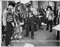 Image of Roberto Maestas being escorted out of mayor's office, Seattle, April 5, 1973