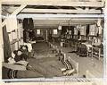 Image of Civilian workers lying in beds at Denny Regrade Transient Camp, Seattle, April 13, 1943