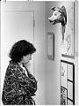 Image of Anne Focke reviewing Pike Place Market piggy bank designs, Seattle, August 28, 1986