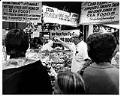 Image of Customers listening to fish monger at Pike Place Fish Market, Seattle, August 6, 1973