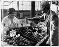 Image of Alice Signey receiving award from Wes Uhlman at Pike Place Market, Seattle, August 17, 1973