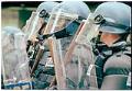 Image of Line of police officers at WTO protest, Seattle, December 1, 1999