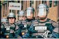 Image of Line of police officers at WTO protest, Seattle, December 1, 1999