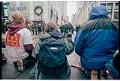 Image of Kneeling demonstrators facing police line at WTO protest, Seattle, December 1, 1999