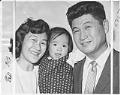 Image of Tamura family posing at U.S. naturalization ceremony, Seattle, November 1, 1965