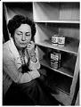 Image of Ruth Velozo worrying over empty shelves at Northwest Harvest, Seattle, April 6, 1981