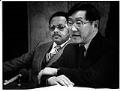 Image of Ben Woo and Bruce Terry speaking about low-income housing plans, Seattle, January 30, 1984