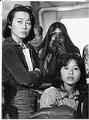 Image of Elaine Ko and Shari Woo of the International District Housing Alliance at a meeting, July 18, 1977