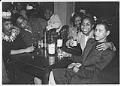 Image of Group of Basin Street nightclub patrons around a table, Seattle, May 1944