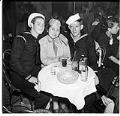 Image of Private Lois Jones and two friends at a jazz club, Seattle, circa 1944