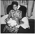 Image of Woman with a young baby, Seattle, 1945
