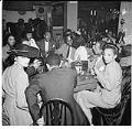 Image of Group at a table at the Basin Streen nightclub, Seattle, December 1945