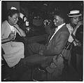 Image of Three people at the bar at the Basin Street nightclub, Seattle, August 18, 1945
