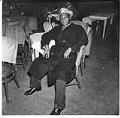 Image of Man seated at table at the Black and Tan nightclub, Seattle, February 1945