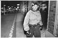 Image of Alex Cleghorn of Q Patrol walking in Capitol Hill, Seattle, January 17, 1992