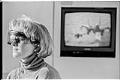 Image of Woman wearing Virtual Vision Sport headset, December 18, 1992