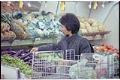 Image of Woman shopping at Viet-Wah supermarket, Seattle, January 14, 1993