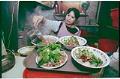 Image of Theresa Vu preparing bowls of pho at Phở Bắc restaurant, Seattle, January 14, 1993