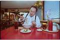 Image of Man eating pho at Pho Bac restaurant, Seattle, January 14, 1993