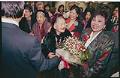 Image of An Tran surrounded by family and friends at Sea-Tac Airport, February 23, 1993