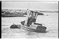 Image of Employee working in Barbee Mill Co. log pond, Renton, March 9, 1993