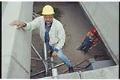 Image of Art Pearson and Enas Epperson at job site, April 8, 1993