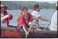 Image of Paddlers in S'Klallam tribe canoe, Port Gamble, June 13, 1993
