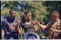 Image of Three people at Juneteenth celebration at Volunteer Park, Seattle, June 19, 1994