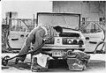 Image of Laurie Zagar vacuuming her car at a car wash, Seattle, March 20, 1980