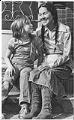 Image of Yvonne (Wanrow) Swan and her daughter sitting on steps, April 7, 1983
