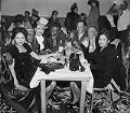 Image of Group around table at nightclub, Seattle, circa 1950