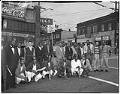 Image of Group of Beni Hassan shrine members outside Gideon's Drugstore, Seattle, circa 1950